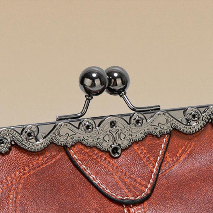 Vintage handbag with clasp closure