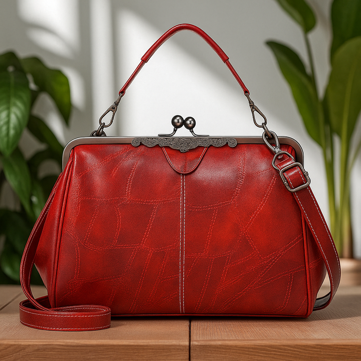 Vintage handbag with clasp closure