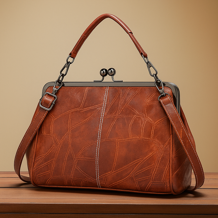 Vintage handbag with clasp closure