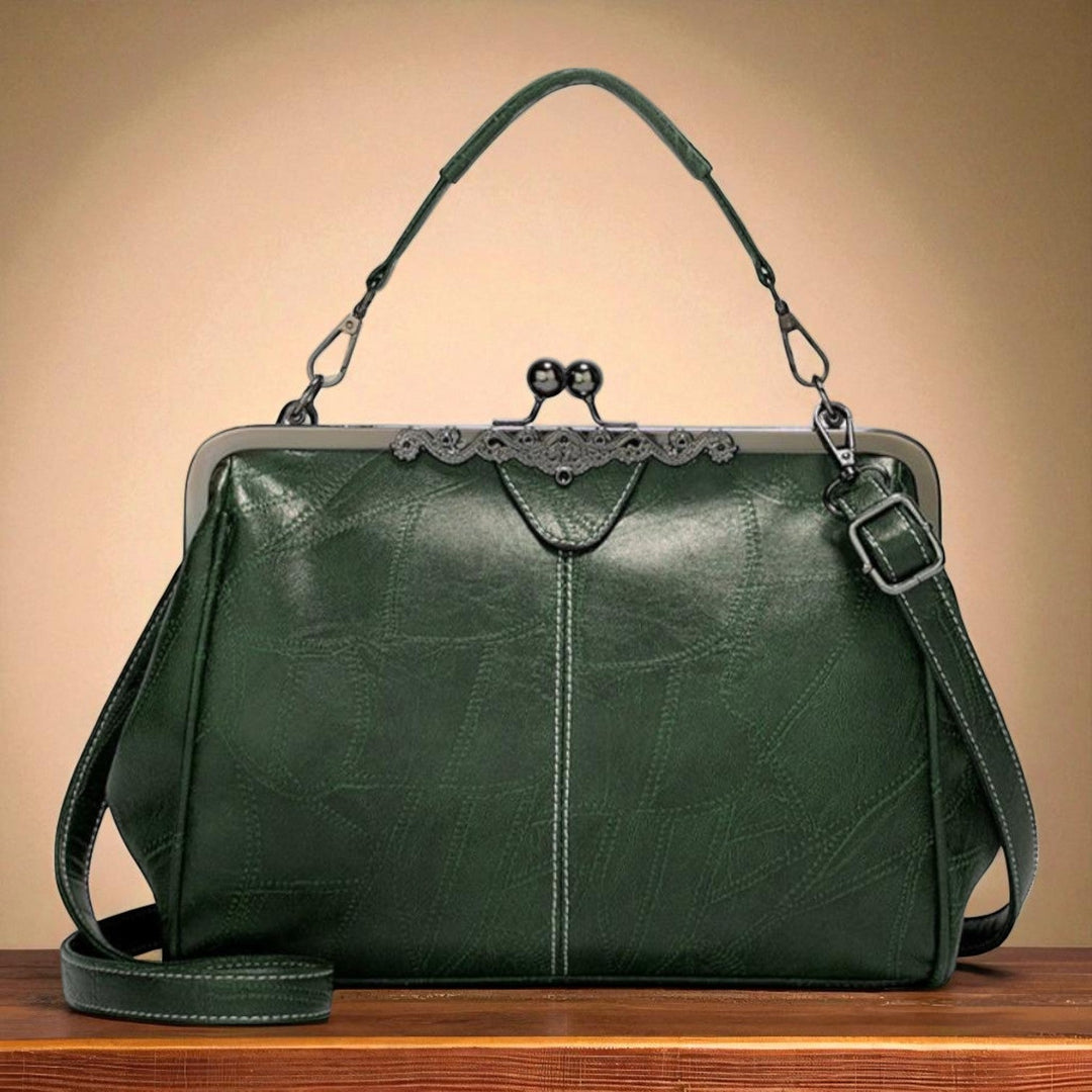 Vintage handbag with clasp closure